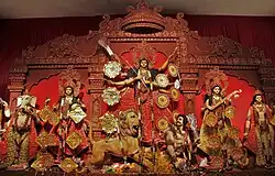 Durga Puja is a multi-day festival in Eastern India that features elaborate temple and stage decorations (pandals), scripture recitation, performance arts, revelry, and processions.