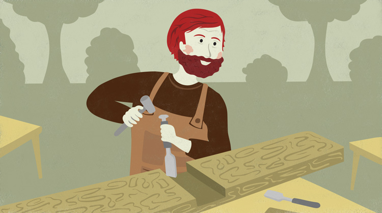 man using a chisel man using a chisel