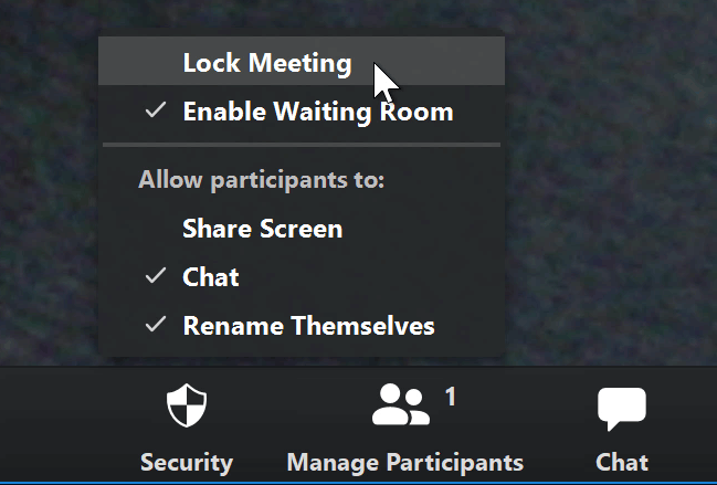 A screenshot of a mouse cursor hovering over the Lock Meeting option in the Zoom app. A screenshot of a mouse cursor hovering over the Lock Meeting option in the Zoom app.